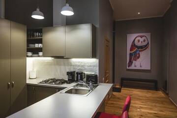 Фото номера Апартаменты с 2 спальнями и балконом Апартаменты Riga Lux Apartments - Ernesta, Free parking г. Рига 7
