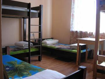 Фото номера Четырехместный номер с общей ванной комнатой Хостелы Central Park Hostel г. Рига 10