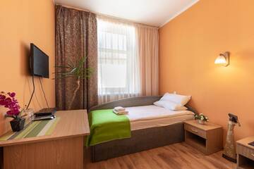 Фото номера Бюджетный двухместный номер с 2 отдельными кроватями Отель Spare Hotel and Bowling г. Рига 4