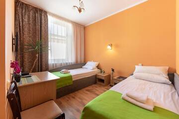 Фото номера Бюджетный двухместный номер с 2 отдельными кроватями Отель Spare Hotel and Bowling г. Рига 5