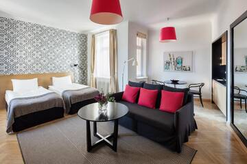 Фото номера Апартаменты с 1 спальней и 2 отдельными кроватями Отель Neiburgs Hotel г. Рига 4