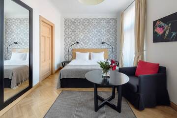 Фото номера Однокомнатные апартаменты с двуспальной кроватью Отель Neiburgs Hotel г. Рига 4