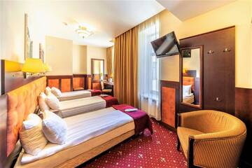 Фото номера Стандартный трехместный номер Отель Rixwell Old Riga Palace Hotel г. Рига 4