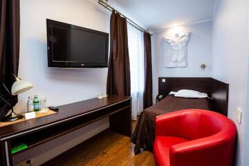 Фото номера Двухместный номер с 2 отдельными кроватями Отель Primo Hotel with FREE parking г. Рига 3