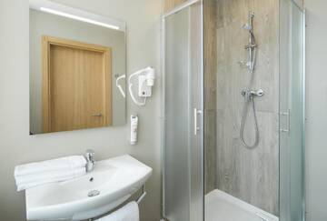 Фото номера Стандартный номер с 1 двуспальной кроватью Отель Ibis Riga Centre г. Рига 14