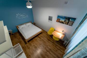 Фото номера Двухместный номер с 1 кроватью и общей ванной комнатой Хостелы Green Cat Rooms г. Рига 4