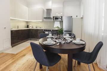 Фото номера Апартаменты с 2 спальнями и балконом Апарт-отели Riga Lux Apartments - Skolas, free parking г. Рига 10