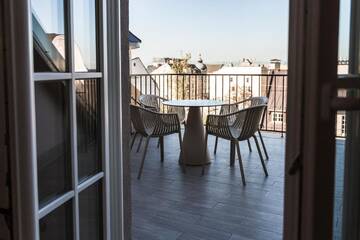 Фото номера Апартаменты в пентхаусе с 2 спальнями и террасой Апарт-отели Riga Lux Apartments - Skolas, free parking г. Рига 9